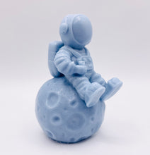 Load image into Gallery viewer, Space Gift | Astronaut Gift | NASA Gift | Astronomy| Astronaut & Moon Vegan Soap Experience out-of-this-world cleanliness with this astronaut casually sitting on the moon! Available in your choice of colour and essential oil. Eco conscious gift. Vegan and cruelty free. All soaps are made with natural clays and essential oils to gently cleanse and nourish your skin. eco-friendly packaging. zero waste gifts. modern gift ideas. handmade home style. eco conscious home. green living.
