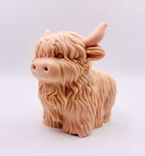 Load image into Gallery viewer, Handmade vegan soaps featuring a large detailed highland cow. crafted with natural French clays, activated charcoal and essential oils. a eco-friendly, zero waste gift that’s cruelty-free, skin-nourishing, and perfect for highland coo lovers and animal themed gifts. small business UK