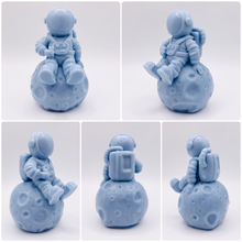 Load image into Gallery viewer, Space Gift | Astronaut Gift | NASA Gift | Astronomy| Astronaut & Moon Vegan Soap Experience out-of-this-world cleanliness with this astronaut casually sitting on the moon! Available in your choice of colour and essential oil. Eco conscious gift. Vegan and cruelty free. All soaps are made with natural clays and essential oils to gently cleanse and nourish your skin. eco-friendly packaging. zero waste gifts. modern gift ideas. handmade home style. eco conscious home. green living.