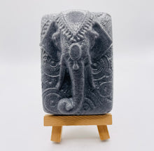 Load image into Gallery viewer, Handmade vegan soaps featuring a majestic elephant head. beautiful eco friendly packaging. crafted with natural French clays, activated charcoal and essential oils. a eco-friendly, zero waste gift that’s cruelty-free, skin-nourishing, the perfect gift for elephant lovers and animal lovers. UK Small Business