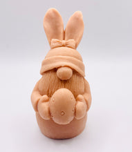 Load image into Gallery viewer, Handmade vegan soaps featuring a gorgeous gnome with easter bunny ears, holding his easter egg packaged in beautiful eco friendly packaging. crafted with natural French clays, activated charcoal and essential oils. a eco-friendly, zero waste gift thatās cruelty-free, skin-nourishing, the perfect gift for any easter hamper or gnome lover. UK Small Business