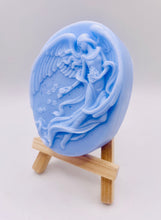 Load image into Gallery viewer, Handmade vegan Guardian Angel soap bar, features a detailed angel with flowing wings. Natural, cruelty-free UK soap ideal for spiritual gifts, zero waste skincare, and sustainable bathroom décor. British-made artisan soap perfect for eco-conscious shoppers. Wrapped in beautiful eco friendly packaging . Small business UK