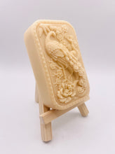 Load image into Gallery viewer, Handmade vegan soaps featuring a detailed peacock, in beautiful eco friendly packaging. crafted with natural French clays, activated charcoal and essential oils. a eco-friendly, zero waste gift that’s cruelty-free, skin-nourishing, the perfect gift for peacock lovers or for animal lovers. small business UK