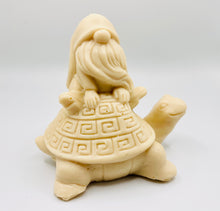 Load image into Gallery viewer, Handmade vegan soaps featuring a detailed turtle with a gnome catching a ride on his back soap. crafted with natural French clays, activated charcoal and essential oils. a eco-friendly, zero waste gift that’s cruelty-free, skin-nourishing, and perfect for turtle lovers and gnome lover gifts. small business UK