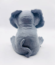 Load image into Gallery viewer, Handmade vegan soap featuring a large chunky elephant with big floppy ears . crafted with natural French clays, activated charcoal and essential oils. a eco-friendly, zero waste gift that’s cruelty-free, skin-nourishing, and perfect for animal lover gifts and gifts for her. UK Small Business.