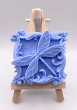 Load image into Gallery viewer, Handmade vegan soaps featuring a detailed dragonfly, in beautiful eco friendly packaging. crafted with natural French clays, activated charcoal and essential oils. a eco-friendly, zero waste gift that’s cruelty-free, skin-nourishing, the perfect gift for dragonfly lovers or for animal lovers. small business UK