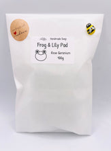 Load image into Gallery viewer, Frog Gift | cute frog gift | unique frog gift,Stocking filler, Frog & Lily Pad Vegan Soap Wooden display easels are available to purchase on a separate listing Meet our adorable Frog & Lilypad soap! This charming little frog holds a lilypad leaf over his head like a tiny umbrella, hiding from the sun and ready to brighten up your day! modern gifts. handmade home style. eco conscious gifts.