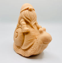 Load image into Gallery viewer, Handmade vegan soaps featuring a detailed snail with a gnome catching a ride on his back soap. crafted with natural French clays, activated charcoal and essential oils. a eco-friendly, zero waste gift that’s cruelty-free, skin-nourishing, and perfect for turtle lovers and gnome lover gifts. small business UK