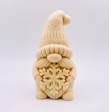Load image into Gallery viewer, Handmade vegan soaps featuring a christmas gnome holding a snowflake in beautiful eco friendly packaging crafted with natural French clays, activated charcoal and essential oils. a eco-friendly, zero waste gift that’s cruelty-free, skin-nourishing, and perfect for gnome lovers and christmas themed gifts. small business UK