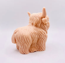 Load image into Gallery viewer, Handmade vegan soaps featuring a large detailed highland cow. crafted with natural French clays, activated charcoal and essential oils. a eco-friendly, zero waste gift that’s cruelty-free, skin-nourishing, and perfect for highland coo lovers and animal themed gifts. small business UK