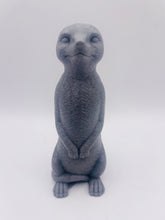 Load image into Gallery viewer, Handmade vegan soaps featuring a cheeky meerkat standing on his back legs. packaged in beautiful eco friendly packaging crafted with natural French clays, activated charcoal and essential oils. a eco-friendly, zero waste gift that’s cruelty-free, skin-nourishing, and perfect for meerkat lovers and animal themed gifts. small business UK