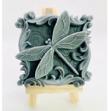 Load image into Gallery viewer, Handmade vegan soaps featuring a detailed dragonfly, in beautiful eco friendly packaging. crafted with natural French clays, activated charcoal and essential oils. a eco-friendly, zero waste gift that’s cruelty-free, skin-nourishing, the perfect gift for dragonfly lovers or for animal lovers. small business UK