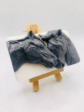 Load image into Gallery viewer, Horse gift, horse lover gift, pony gift. Eco conscious gift horse rider gift Beautifully detailed and full of character, this handmade soap features two horses nuzzling together - a lovely gift for any equestrian or horse lover. Made with activated charcoal to deeply cleanse and refresh the skin, this vegan and cruelty-free bar combines practicality with a touch of rustic charm. modern gifts. handmade home style. zero waste gifts. eco conscious home gifts