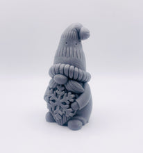 Load image into Gallery viewer, Handmade vegan soaps featuring a christmas gnome holding a snowflake in beautiful eco friendly packaging crafted with natural French clays, activated charcoal and essential oils. a eco-friendly, zero waste gift that’s cruelty-free, skin-nourishing, and perfect for gnome lovers and christmas themed gifts. small business UK