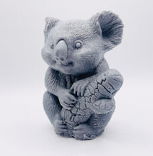 Load image into Gallery viewer, Handmade vegan soaps featuring a chunky koala bear climbing a tree packaged in beautiful eco friendly packaging crafted with natural French clays, activated charcoal and essential oils. a eco-friendly, zero waste gift that’s cruelty-free, skin-nourishing, and perfect for koala bear lovers and animal themed gifts. small business UK