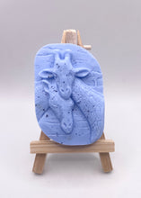 Load image into Gallery viewer, Handmade vegan soaps featuring two nuzzling giraffes in beautiful eco friendly packaging. crafted with natural French clays, activated charcoal and essential oils. a eco-friendly, zero waste gift thatās cruelty-free, skin-nourishing, the perfect gift for giraffe lovers, or for animal lover gifts. small business UK