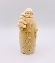 Load image into Gallery viewer, Christmas Gift UK. Handmade Father Christmas vegan soap in indigo blue, detailed with a long beard, cosy hat, flowing robe with star cutouts, and holding a small Christmas tree over one shoulder and a lantern in the other hand. available in your own choice of coloured clays and essential oils. zero waste gift UK.