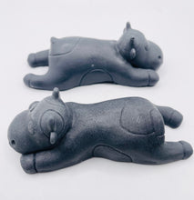 Load image into Gallery viewer, Handmade vegan soaps featuring a set of two sleeping cows . gift boxed in beautiful eco friendly packaging. crafted with natural French clays, activated charcoal and essential oils. a eco-friendly, zero waste gift that’s cruelty-free, skin-nourishing, the perfect gift for cow lovers and animal lovers. UK Small Business