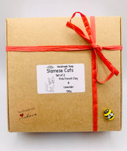 Load image into Gallery viewer, Handmade vegan Siamese cat shaped vegan soaps, set of two, beautifully gift boxed in eco friendly packaging. crafted with natural French clays, activated charcoal and essential oils. a eco-friendly, zero waste gift that’s cruelty-free, skin-nourishing, and perfect for animal lovers. Small Business UK