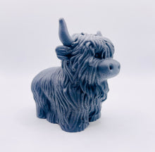 Load image into Gallery viewer, Handmade vegan soaps featuring a large detailed highland cow. crafted with natural French clays, activated charcoal and essential oils. a eco-friendly, zero waste gift that’s cruelty-free, skin-nourishing, and perfect for highland coo lovers and animal themed gifts. small business UK