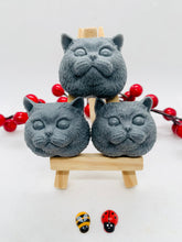 Load image into Gallery viewer, Handmade vegan soaps featuring a set of three little cat faces gift boxed in beautiful eco friendly packaging. crafted with natural French clays, activated charcoal and essential oils. a eco-friendly, zero waste gift that’s cruelty-free, skin-nourishing, the perfect gift for cat lovers or animal lovers. small business UK