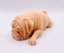 Load image into Gallery viewer, Handmade vegan soap featuring sleepy pug lying down and packed in beautiful eco friendly packaging. crafted with natural French clays, activated charcoal and essential oils. a eco-friendly, zero waste gift that’s cruelty-free, skin-nourishing, and perfect for pug owners, dog lovers or animal themed gifts. Small business UK