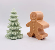 Load image into Gallery viewer, Handmade vegan soaps shaped as a gingerbread man and a Christmas’s tree, gift boxed. crafted with natural French clays, activated charcoal and essential oils. a eco-friendly, zero waste gift that’s cruelty-free, skin-nourishing, and perfect for secret Santa and Christmas gifting . small business UK