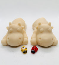 Load image into Gallery viewer, Handmade vegan soaps featuring a set of two sleeping cows . gift boxed in beautiful eco friendly packaging. crafted with natural French clays, activated charcoal and essential oils. a eco-friendly, zero waste gift that’s cruelty-free, skin-nourishing, the perfect gift for cow lovers and animal lovers. UK Small Business