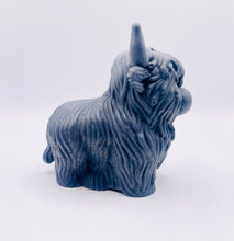 Load image into Gallery viewer, Handmade vegan soaps featuring a large detailed highland cow. crafted with natural French clays, activated charcoal and essential oils. a eco-friendly, zero waste gift that’s cruelty-free, skin-nourishing, and perfect for highland coo lovers and animal themed gifts. small business UK