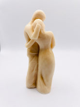 Load image into Gallery viewer, Handmade vegan soaps featuring a pregnant couple with the man gently embracing the woman and placing his hand on her stomach / bump . packaged in beautiful eco friendly packaging. crafted with natural French clays, activated charcoal and essential oils. a eco-friendly, zero waste gift that’s cruelty-free, skin-nourishing, the perfect gift for any new mother or baby shower gift. UK Small Business