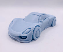 Load image into Gallery viewer, Handmade vegan soaps featuring a sports car wrapped in beautiful eco friendly packaging crafted with natural French clays, activated charcoal and essential oils. a eco-friendly, zero waste gift that’s cruelty-free, skin-nourishing, and perfect gift for sports car lovers and gifts for him. small business UK