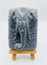 Load image into Gallery viewer, Handmade vegan soaps featuring a majestic elephant head. beautiful eco friendly packaging. crafted with natural French clays, activated charcoal and essential oils. a eco-friendly, zero waste gift that’s cruelty-free, skin-nourishing, the perfect gift for elephant lovers and animal lovers. UK Small Business
