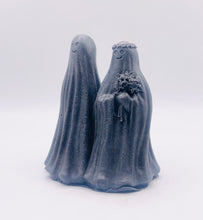 Load image into Gallery viewer, Handmade vegan soaps shaped as a ghost bride and groom. crafted with natural French clays, activated charcoal and essential oils. a eco-friendly, zero waste gift that’s cruelty-free, skin-nourishing, and perfect for Halloween weddings and gifting.
small business UK