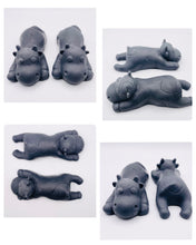 Load image into Gallery viewer, Handmade vegan soaps featuring a set of two sleeping cows . gift boxed in beautiful eco friendly packaging. crafted with natural French clays, activated charcoal and essential oils. a eco-friendly, zero waste gift that’s cruelty-free, skin-nourishing, the perfect gift for cow lovers and animal lovers. UK Small Business