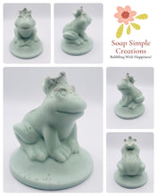 Load image into Gallery viewer, Handmade vegan soaps featuring a frog wearing a crown, in beautiful eco friendly packaging. crafted with natural French clays, activated charcoal and essential oils. a eco-friendly, zero waste gift that’s cruelty-free, skin-nourishing, the perfect gift for frog lovers or for animal lovers. small business UK
