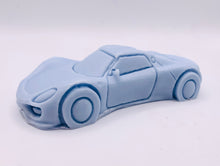 Load image into Gallery viewer, Handmade vegan soaps featuring a sports car wrapped in beautiful eco friendly packaging crafted with natural French clays, activated charcoal and essential oils. a eco-friendly, zero waste gift that’s cruelty-free, skin-nourishing, and perfect gift for sports car lovers and gifts for him. small business UK