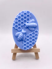 Load image into Gallery viewer, Handmade vegan soaps featuring two bees on honeycomb wrapped in beautiful eco friendly packaging crafted with natural French clays, activated charcoal and essential oils. a eco-friendly, zero waste gift that’s cruelty-free, skin-nourishing, and perfect gift for bee lovers and animal themed gifts. small business UK