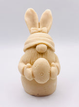 Load image into Gallery viewer, Handmade vegan soaps featuring a gorgeous gnome with easter bunny ears, holding his easter egg packaged in beautiful eco friendly packaging. crafted with natural French clays, activated charcoal and essential oils. a eco-friendly, zero waste gift thatās cruelty-free, skin-nourishing, the perfect gift for any easter hamper or gnome lover. UK Small Business