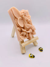 Load image into Gallery viewer, Handmade vegan soaps featuring a fairy sitting on leaves and holding a flower in beautiful eco friendly packaging. crafted with natural French clays, activated charcoal and essential oils. a eco-friendly, zero waste gift that’s cruelty-free, skin-nourishing, the perfect gift for fairy lovers or mothers day. small business UK
