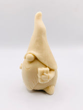 Load image into Gallery viewer, Handmade vegan soaps featuring a gorgeous gnome holding a gift in his hand packed in beautiful eco friendly packaging. crafted with natural French clays, activated charcoal and essential oils. a eco-friendly, zero waste gift that’s cruelty-free, skin-nourishing, the perfect gift for gnome lovers, Christmas gifts or for animal lover gifts. small business UK