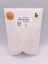 Load image into Gallery viewer, Handmade vegan soaps featuring a cute reindeer in beautiful eco friendly packaging. crafted with natural French clays, activated charcoal and essential oils. a eco-friendly, zero waste gift that’s cruelty-free, skin-nourishing, the perfect gift for reindeer lovers, or for animal lover gifts. small business UK