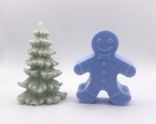 Load image into Gallery viewer, Handmade vegan soaps shaped as a gingerbread man and a Christmas’s tree, gift boxed. crafted with natural French clays, activated charcoal and essential oils. a eco-friendly, zero waste gift that’s cruelty-free, skin-nourishing, and perfect for secret Santa and Christmas gifting . small business UK