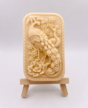 Load image into Gallery viewer, Handmade vegan soaps featuring a detailed peacock, in beautiful eco friendly packaging. crafted with natural French clays, activated charcoal and essential oils. a eco-friendly, zero waste gift that’s cruelty-free, skin-nourishing, the perfect gift for peacock lovers or for animal lovers. small business UK