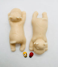 Load image into Gallery viewer, Handmade vegan soaps featuring a set of two sleeping cows . gift boxed in beautiful eco friendly packaging. crafted with natural French clays, activated charcoal and essential oils. a eco-friendly, zero waste gift that’s cruelty-free, skin-nourishing, the perfect gift for cow lovers and animal lovers. UK Small Business