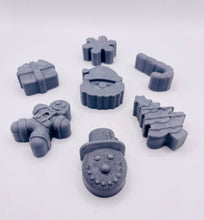 Load image into Gallery viewer, Christmas Themed Vegan Hand Soaps Gift Boxed Give the gift of clean hands! This set of six Christmas themed hand soaps make the perfect secret Santa, stocking filler and friendship gifts! Each set contains a Santa, a candy cane, snowflake, gift box, gingerbread man, snowman, and a Christmas tree. (Yes, they’re almost too cute to use… almost.) Available in your choice of French clay and essential oil: modern gifts. zero waste gifts UK. handmade gifts UK. Handmade home style UK. BrIrish made. Handmade UK.