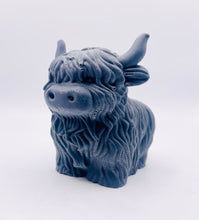 Load image into Gallery viewer, Handmade vegan soaps featuring a large detailed highland cow. crafted with natural French clays, activated charcoal and essential oils. a eco-friendly, zero waste gift that’s cruelty-free, skin-nourishing, and perfect for highland coo lovers and animal themed gifts. small business UK
