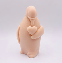 Load image into Gallery viewer, Handmade vegan soaps featuring a penguin holding a love heart packaged in beautiful eco friendly packaging crafted with natural French clays, activated charcoal and essential oils. a eco-friendly, zero waste gift that’s cruelty-free, skin-nourishing, and perfect for penguin lovers, christmas gifts and animal themed gifts. small business UK