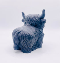 Load image into Gallery viewer, Handmade vegan soaps featuring a large detailed highland cow. crafted with natural French clays, activated charcoal and essential oils. a eco-friendly, zero waste gift that’s cruelty-free, skin-nourishing, and perfect for highland coo lovers and animal themed gifts. small business UK