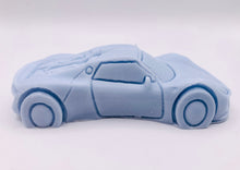 Load image into Gallery viewer, Handmade vegan soaps featuring a sports car wrapped in beautiful eco friendly packaging crafted with natural French clays, activated charcoal and essential oils. a eco-friendly, zero waste gift that’s cruelty-free, skin-nourishing, and perfect gift for sports car lovers and gifts for him. small business UK