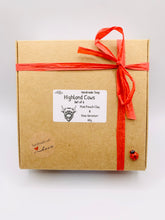 Load image into Gallery viewer, Handmade vegan soaps featuring a set of six mini highland cow soaps gift boxed in beautiful eco friendly packaging. crafted with natural French clays, activated charcoal and essential oils. a eco-friendly, zero waste gift that’s cruelty-free, skin-nourishing, and perfect for highland coo lovers or animal themed gifts. Small business UK